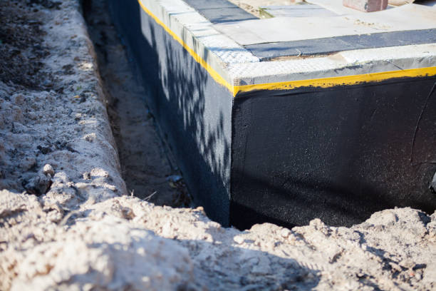 Professional Waterproofing technician working in Coden, AL
